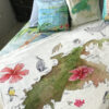 This fleece blanket features St. John watercolors. Perfect snuggling up with a book, watching a favorite movie or planning your next vacation on St. John!