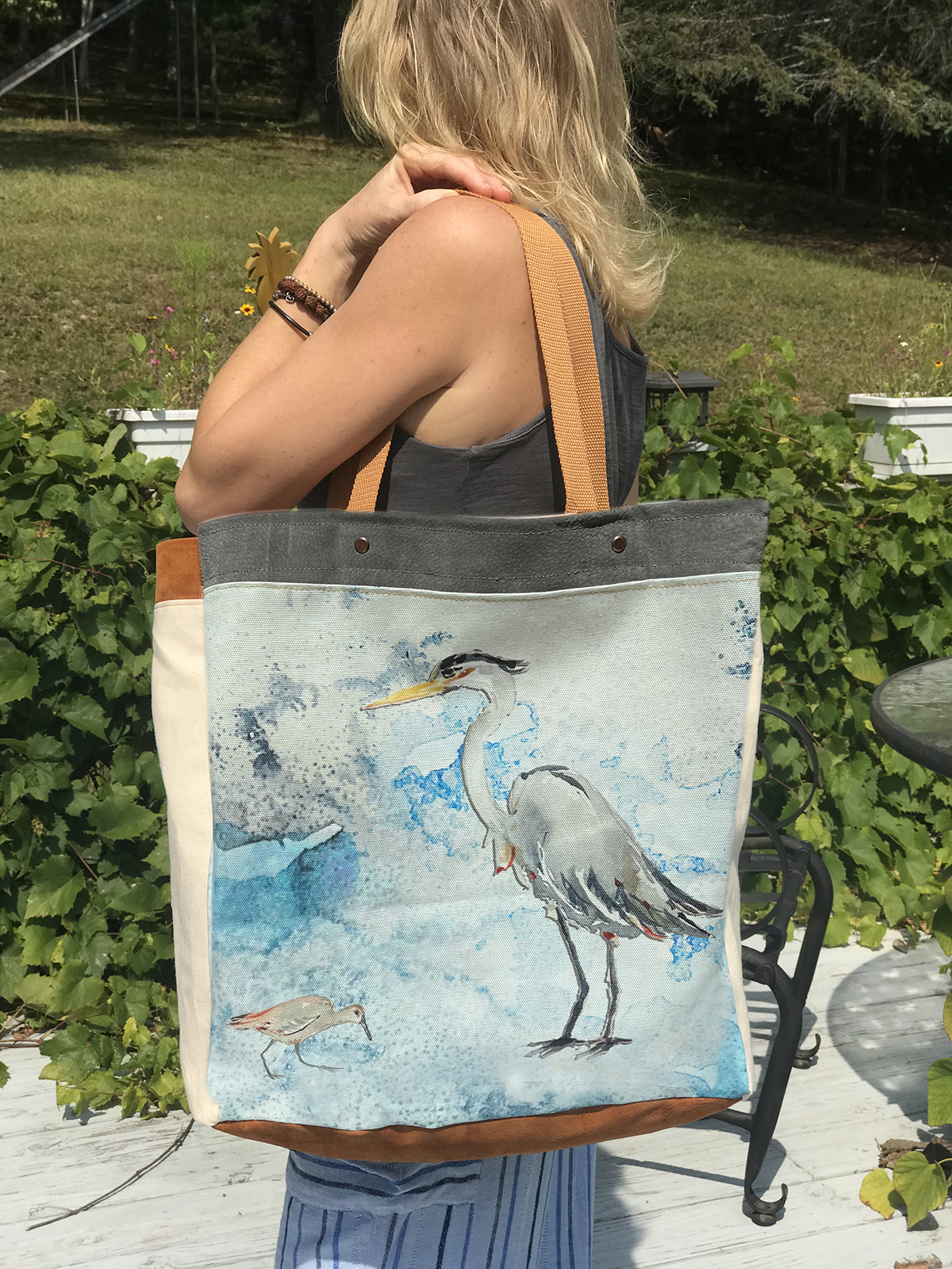 This Canvas Leather tote bag is lovingly designed and sewn by Hibiscus Jazz artist Ali Norton. Add this vintage inspired accessory to your bohemian style.
