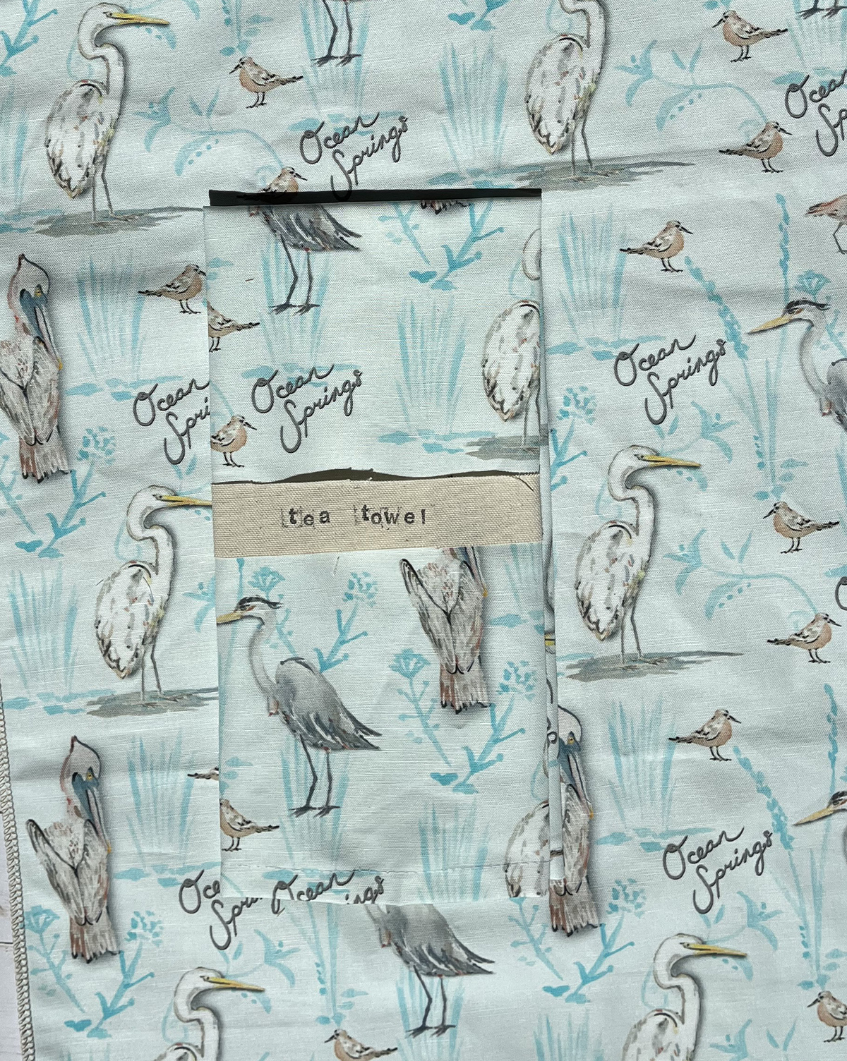 Beach kitchen decor dish towels made from sea bird art fabric. Zero waste kitchen decor with original designs by local artist Ali Norton.